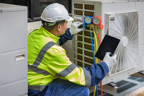 Professional Heat Pump Repair technician working in Porter, IN